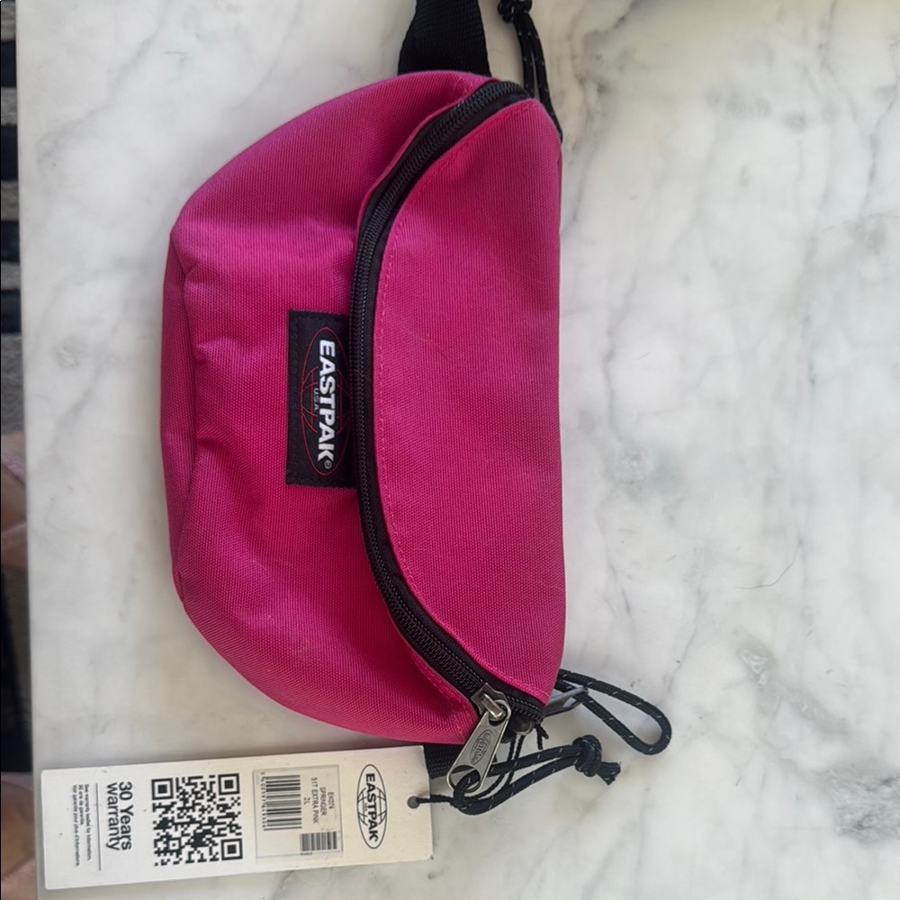 Eastpak Pink Fanny pak  with Black Accents. Style is Springer 2L